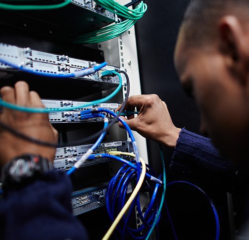 Service engineer working on a server