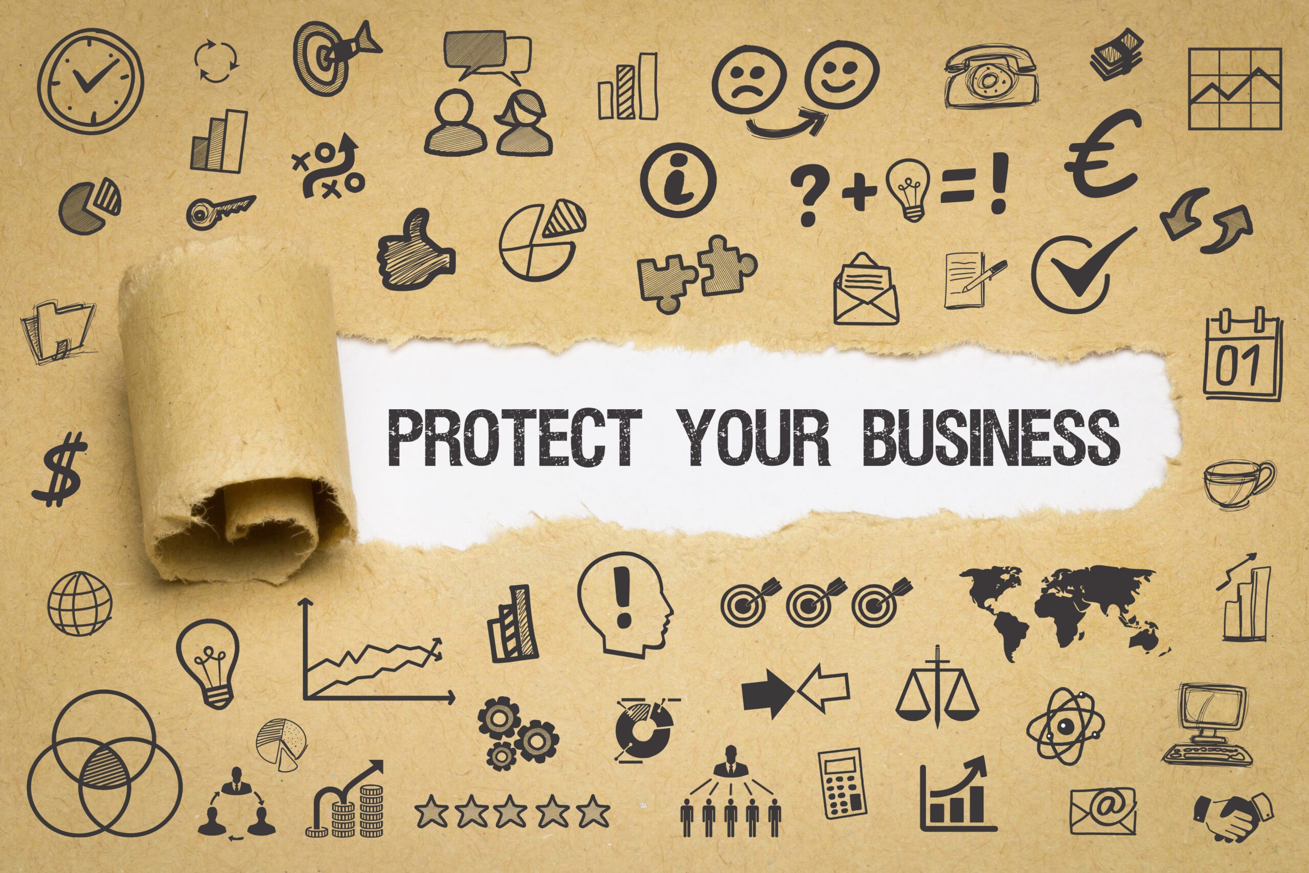 A piece of brown paper with different business icons drawn and a slip torn in the center that reads: Protect Your Business.