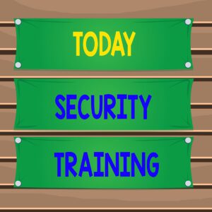 A sign on a wooden board that reads, “Today Security Training.”